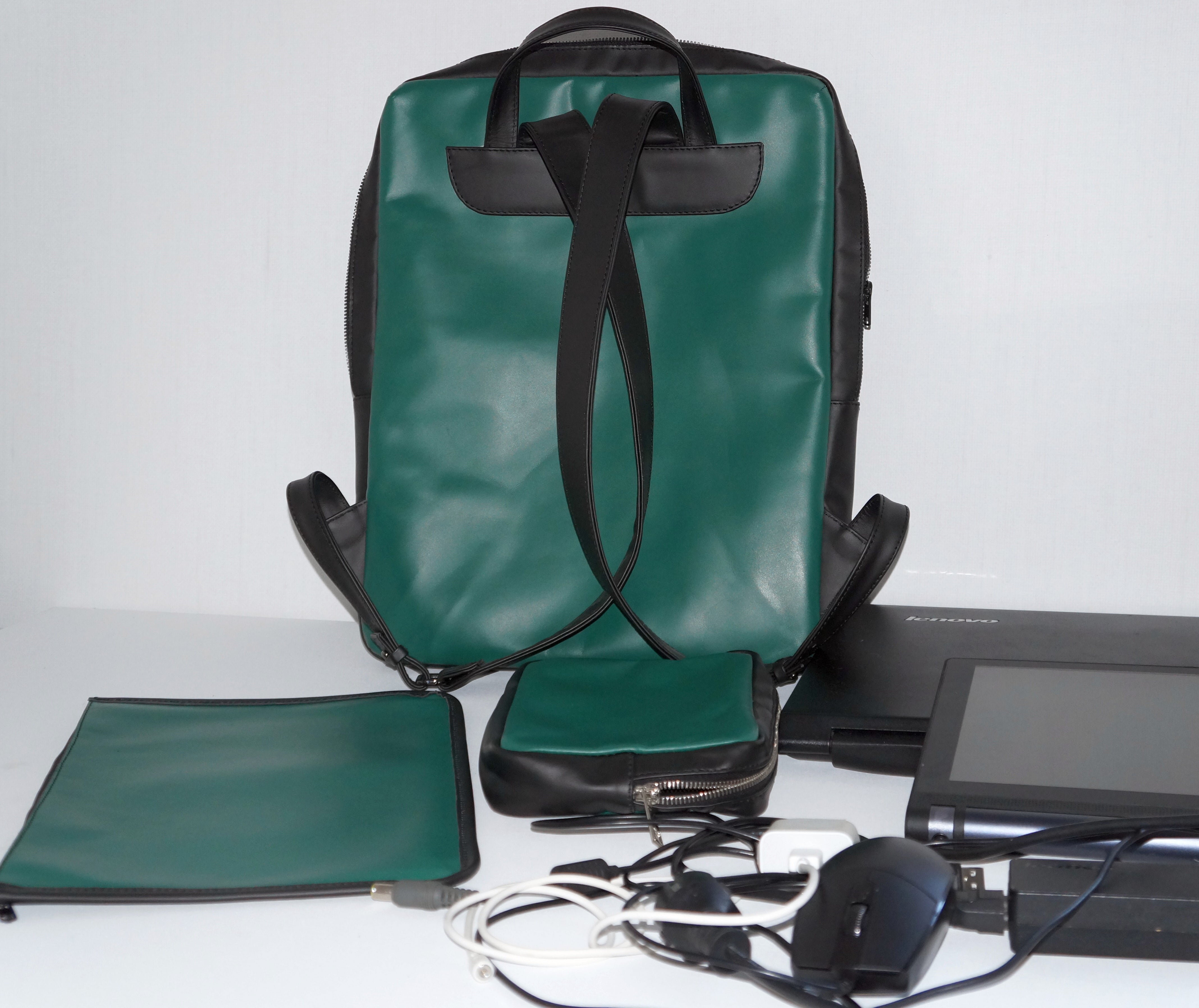 A Green Leather Computer Backpack: Style and Functionality Combined