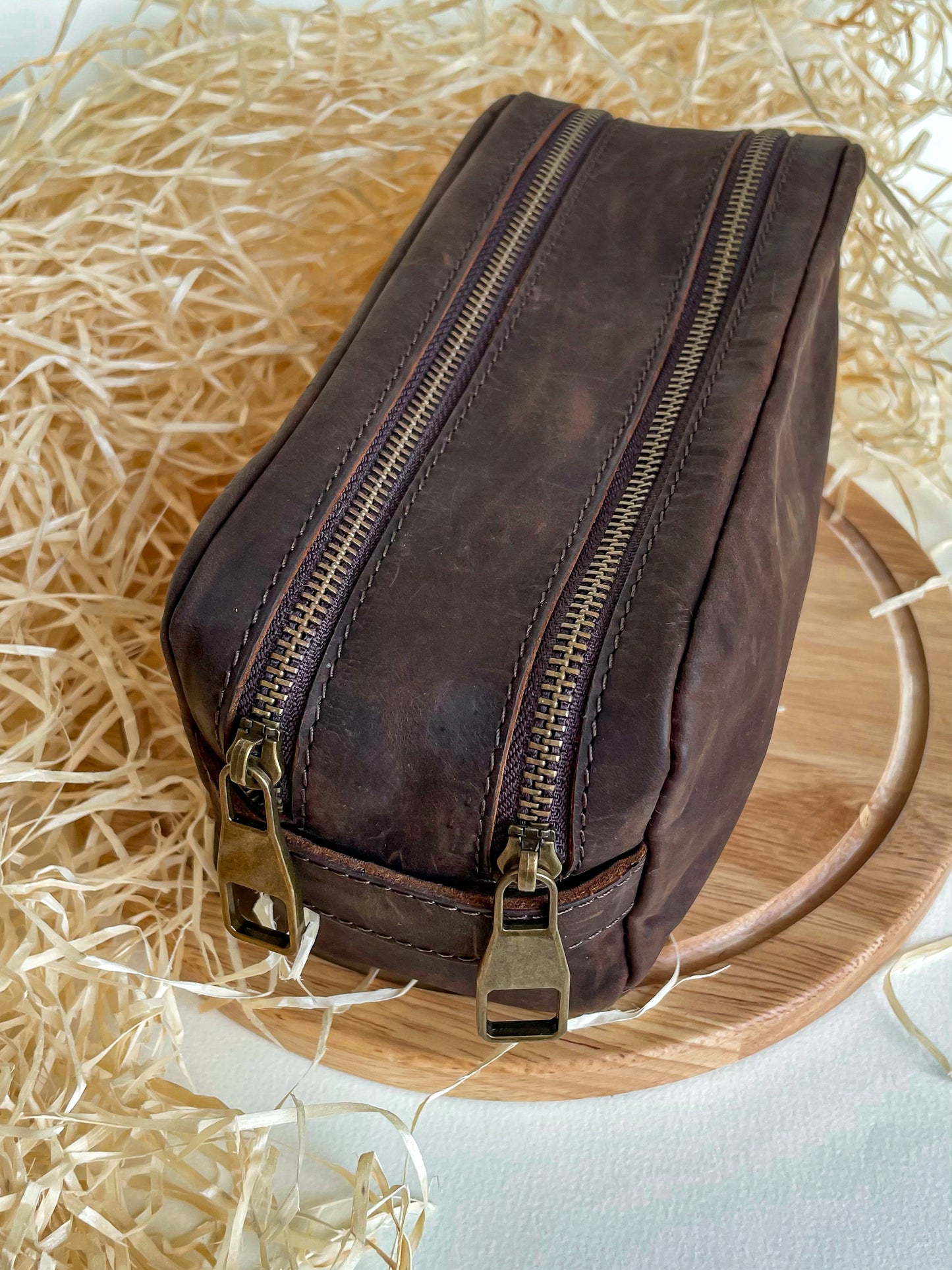 brown leather toiletry bag