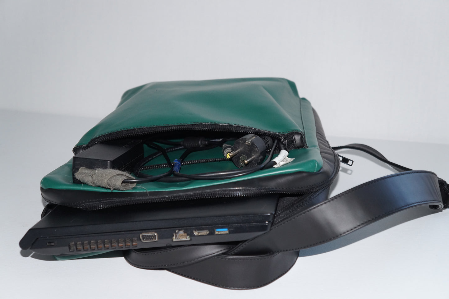 laptop green leather backpack